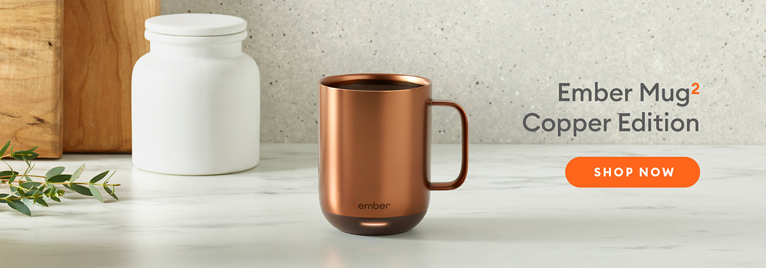 Ember Mug2 Copper Edition sits on a marble countertop. Shop Now.